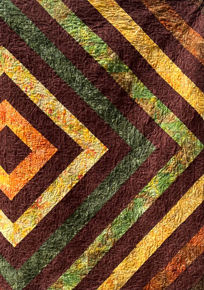 Cosy handmade lap-size quilts for comfort,  decor and gifts